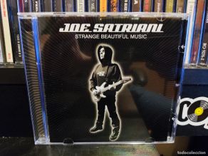 Music CDs: JOE SATRIANI - STRANGE BEAUTIFUL MUSIC